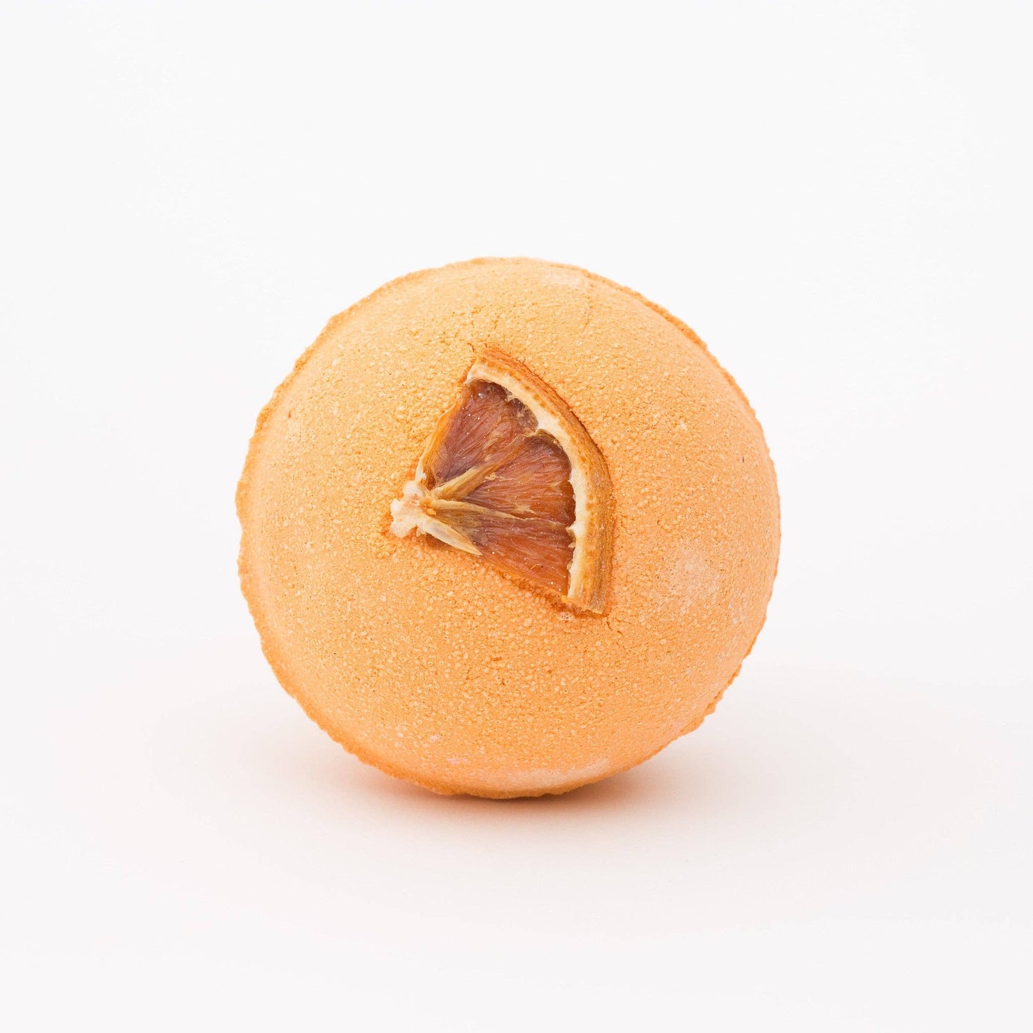 Quintessentially English Tangerine Dream Bath Bomb with a real slice of orange.