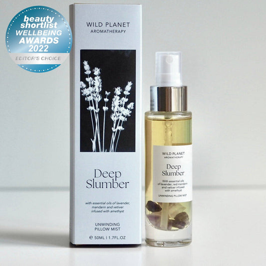Deep Slumber Sleep Pillow Mist with calming lavender and amethyst crystals.