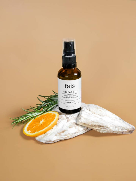 Fais Restore It Mist for dull or damaged strands, enhancing manageability and shine.