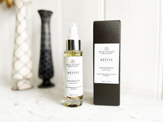 Wild Planet Revive Aura Mist, refreshes personal space and uplifts spirit.