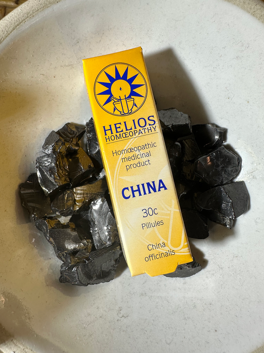 Helios Cina 30c homeopathic remedy for digestive health and emotional well-being.