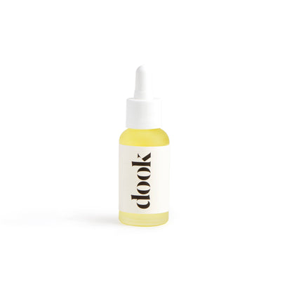 Dook Leave-in Conditioning Oil with organic Argan oil to hydrate all hair types.